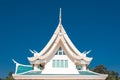 Window in a roof against blue sky with triangle shape in Thaila Royalty Free Stock Photo