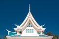 Window in a roof against blue sky with triangle shape in Thaila Royalty Free Stock Photo