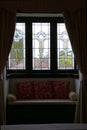 Window seat and leaded glass windows, Federation style home, Australia.