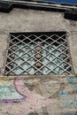 Window in a shabby wall, Rome, Italy