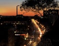 Night city light traffic at orange sunset building and traffic urban panorama  Tallinn Estonia Royalty Free Stock Photo