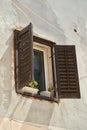 Window with shutter in the old town of Rab in Croatia Royalty Free Stock Photo