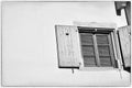 Window and shutter with a heart. White wall, free space. Details. Colmar, France Royalty Free Stock Photo