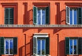 Window with shutters on a house facade in Rome Lazio Italy