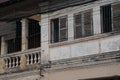 Window shutters and Verandah of old french colonial building Royalty Free Stock Photo