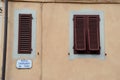 Window shutters in Vinci city in Tuscany, Italy. Royalty Free Stock Photo