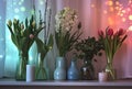 a window sill with vases of tulips and hyacinths