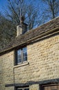 The window of a small home in bibury village in cotswolds