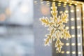 Window with snowflake and bokeh lights line. Horizontal with copy space. Hotel and restaurant booking on holidays, party