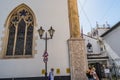 Gibraltar - August 3, 2022 - Window in stained glass of the Governor\'s Residence and entrance of chapel with tourists Royalty Free Stock Photo