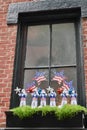 Window with Star Wars Stormtrooper figures wearing Stars and Stripes. Boston, USA, 18.07.2019.