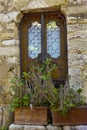 Window in the stone wall. Eze village at french Riviera coast Provence, France Royalty Free Stock Photo