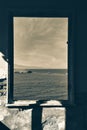 Window to the sea in an abandoned house and across the islands, the Aegean sea, FoÃÂ§a, Phokai, IzmirTurkey