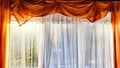 Window with transparent white tulle beige curtains. Background and texture with fabric and copy space for text