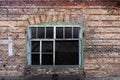 Window in a very old red brick fortress Royalty Free Stock Photo