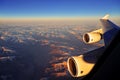 Window view from an airplane cruising over the Himalaya mountains during sunset..Himalayas, China - 09/15/2016 Royalty Free Stock Photo