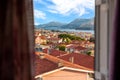 Window view of Argostoli, capital city of Kefalonia and many rooftops Royalty Free Stock Photo