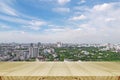 Window view with blurred cityscape.