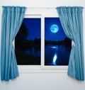 Window view of the full moon Royalty Free Stock Photo