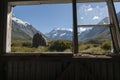 Window view in old trampers hut in mountains, on the Hookers Track, Mount Cook in New Zealand s Southern Alpine region Royalty Free Stock Photo