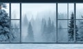 A window with a view of a snowy forest Royalty Free Stock Photo