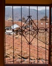 Window view to red roofs of Cusco Peru Royalty Free Stock Photo