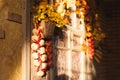 Window with vintage shutters decorated yellow leaves, flowers ba Royalty Free Stock Photo