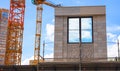 Window in the wall as an example of a house under construction.