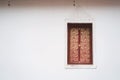 Window on the wall of Temple Wat Phra That Khao Noi, Nan Province, Thailand.