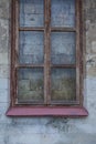 Window in the wall walled up with stones