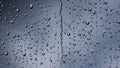 Window wallpaper with accumulating raindrops Royalty Free Stock Photo