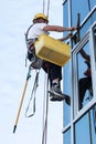 Window washer working at building outdoor Royalty Free Stock Photo