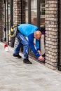 Window washer working at building outdoor