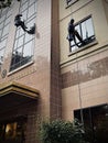 Window washers outside the Foundation for California Community Colleges, Sacramento, USA Royalty Free Stock Photo