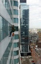 Window washers on skyscrapers in Toronto Canada