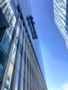 Window washers working on an office tower