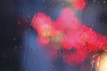 Raindrops and red lights Royalty Free Stock Photo