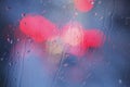 Raindrops and red lights Royalty Free Stock Photo