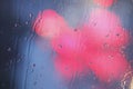 Raindrops and red lights Royalty Free Stock Photo