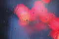 Raindrops and red lights Royalty Free Stock Photo