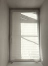 A window with a white curtain is open Royalty Free Stock Photo