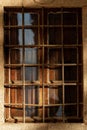 Window with wrought iron security bars - Tuscany Italy Royalty Free Stock Photo