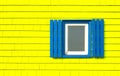 Window on yellow wooden wall Royalty Free Stock Photo