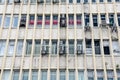 Windows and air conditioning units on office building Royalty Free Stock Photo