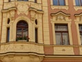 Windows of an ancient decorated building of Prague in Czech Republic.