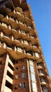 Windows and balconies residential apartment building with interesting modern design Royalty Free Stock Photo