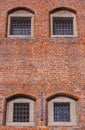 Windows with bars of medieval prison