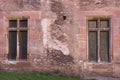 Windows and brick wall of an old building