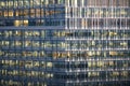 Windows of a business tower showing people at work Royalty Free Stock Photo