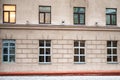 Windows in a city brick building